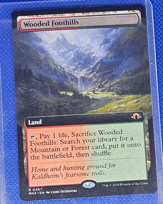 Wooded Foothills-Modern Horizons 3-#467 Borderless Magic: the Gathering